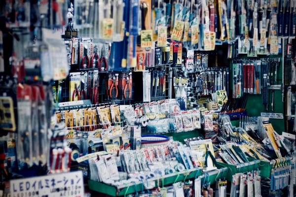 A shelf full of many tools in an art-supply store