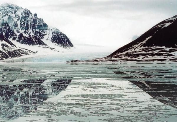 An image of a complex and dynamic winter landscape, including what looks to be a glacier